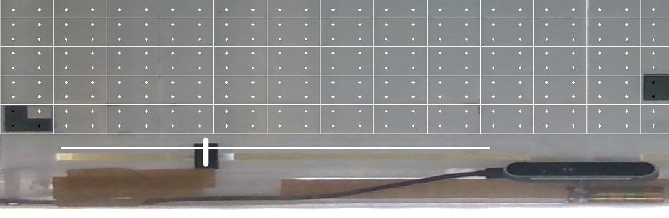 Image of slider: a token with dark underside moving along a slid.